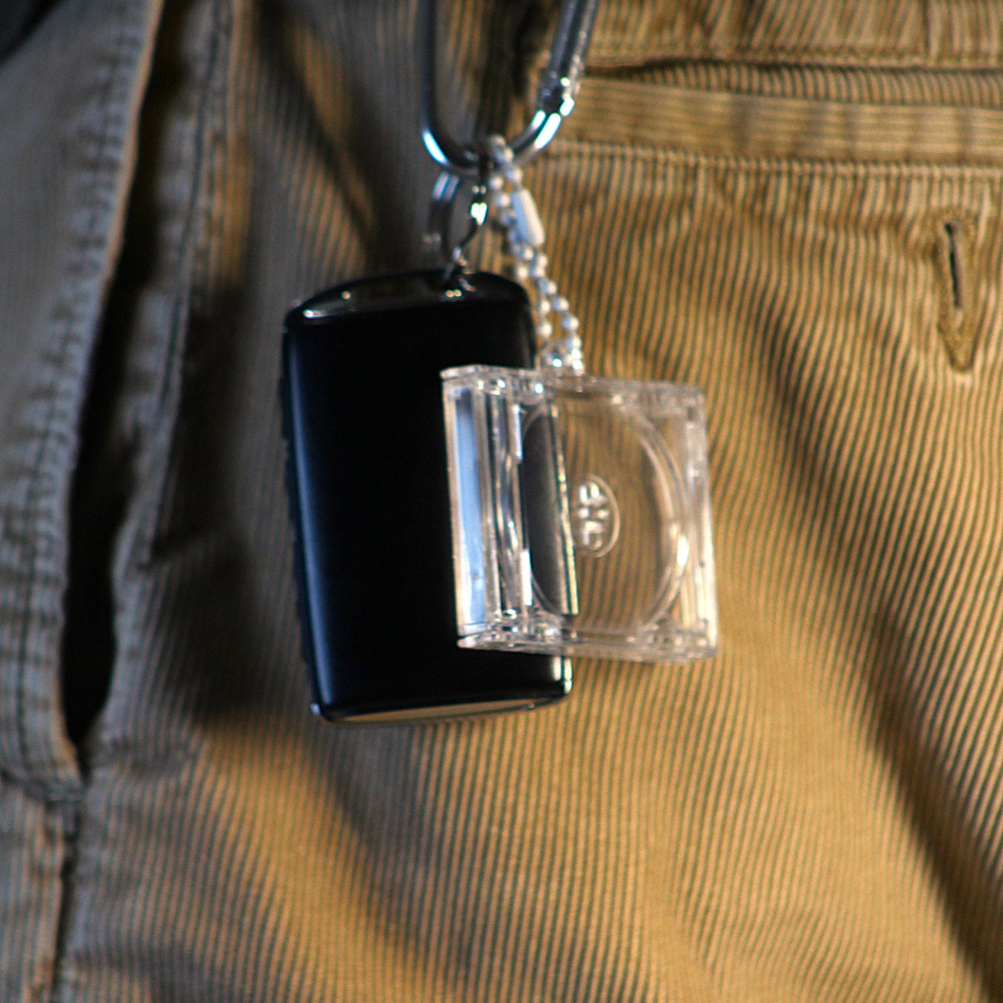 clear acrylic keychain cd case hung on belt loop